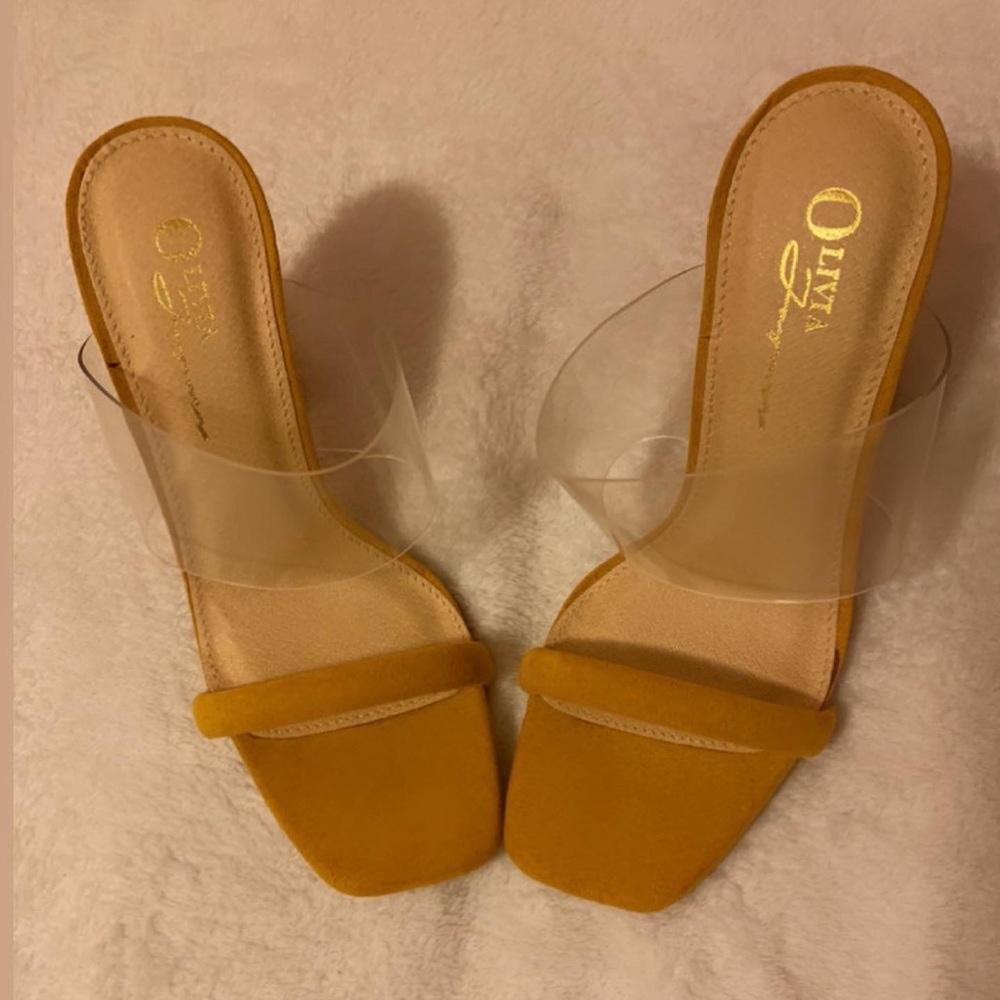 Never worn, comes with dust bag.